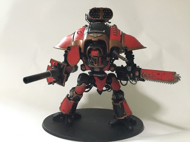 Large robotic warrior in red and black armor